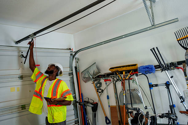 Professional Garage Door Panel Replacement technician working in La Porte City, IA